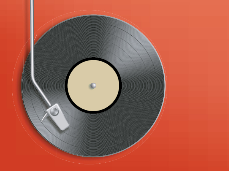 Turntable playing a vinyl record on a red background.