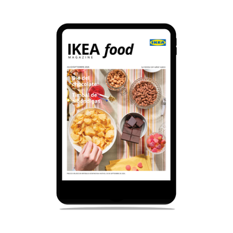 A digital tablet in portrait orientation displaying the cover of "IKEA food magazine" on its screen, against a white background.