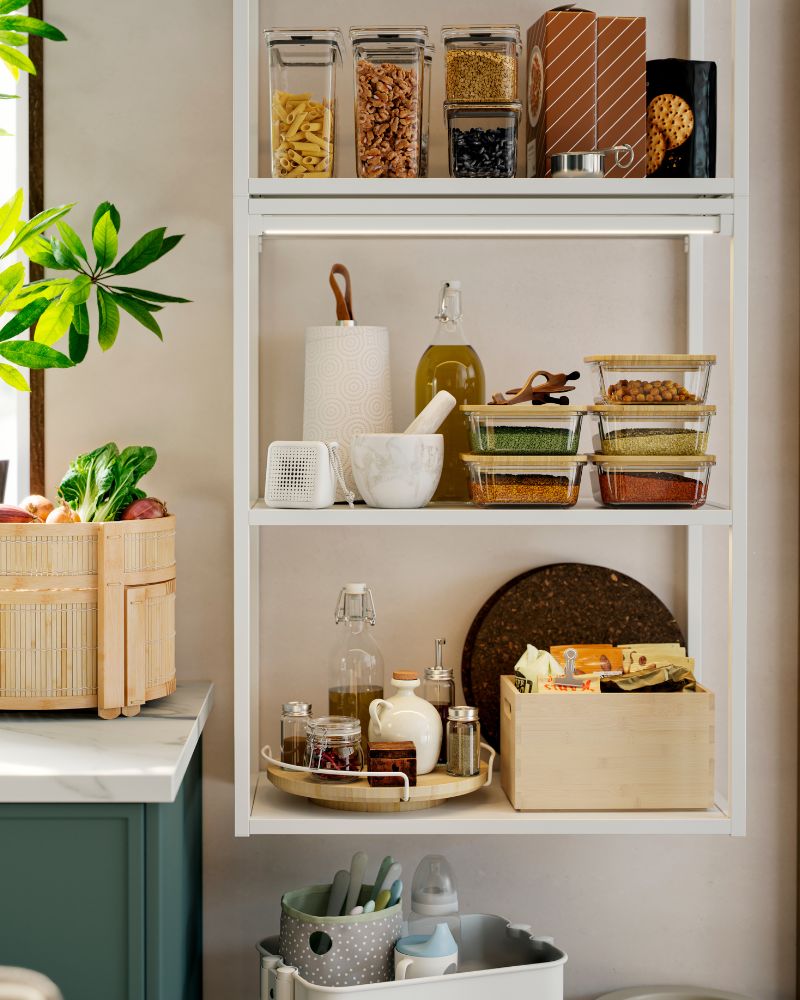 Functional pantry with IKEA 365+ containers, KORKEN bottles, KANELMOTT baskets and APTITLIG turntable.