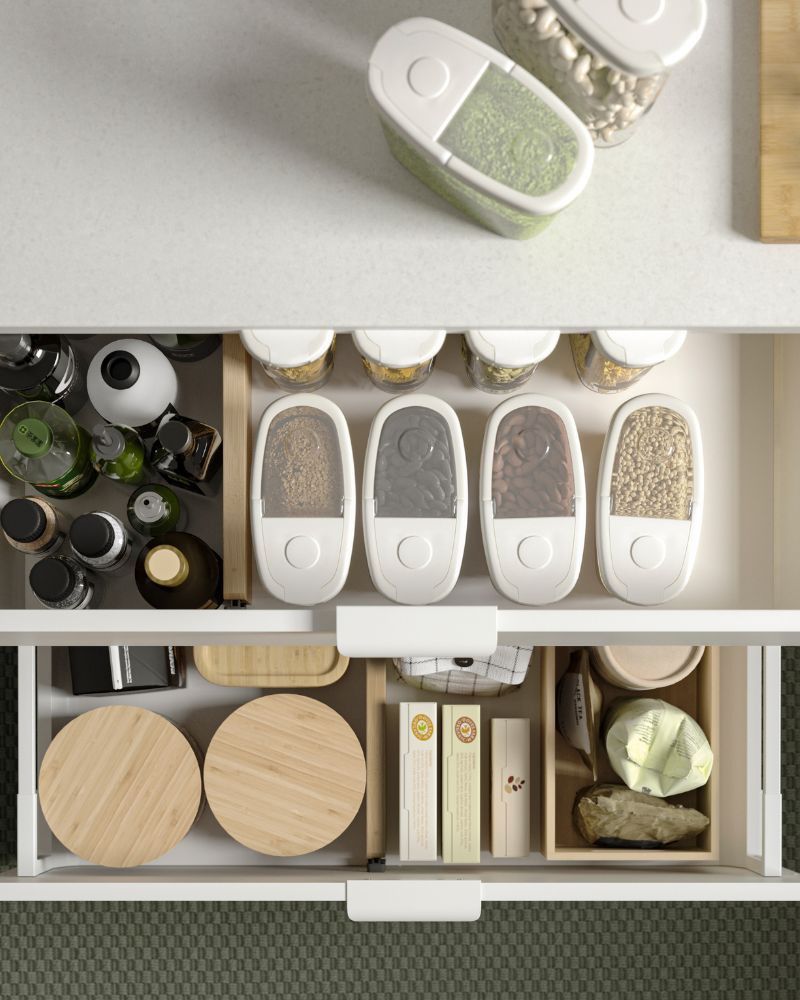 Organized kitchen with VARIERA drawer dividers, IKEA 365+ containers and EKLATANT canisters.